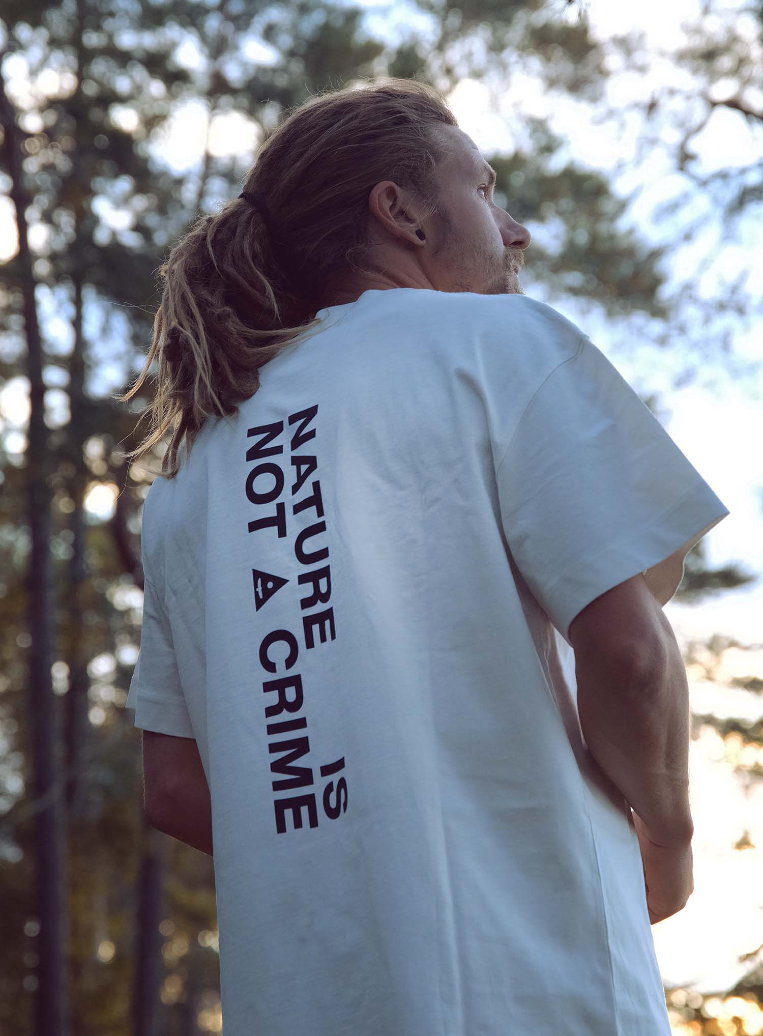 NATURE IS NOT A CRIME TEE